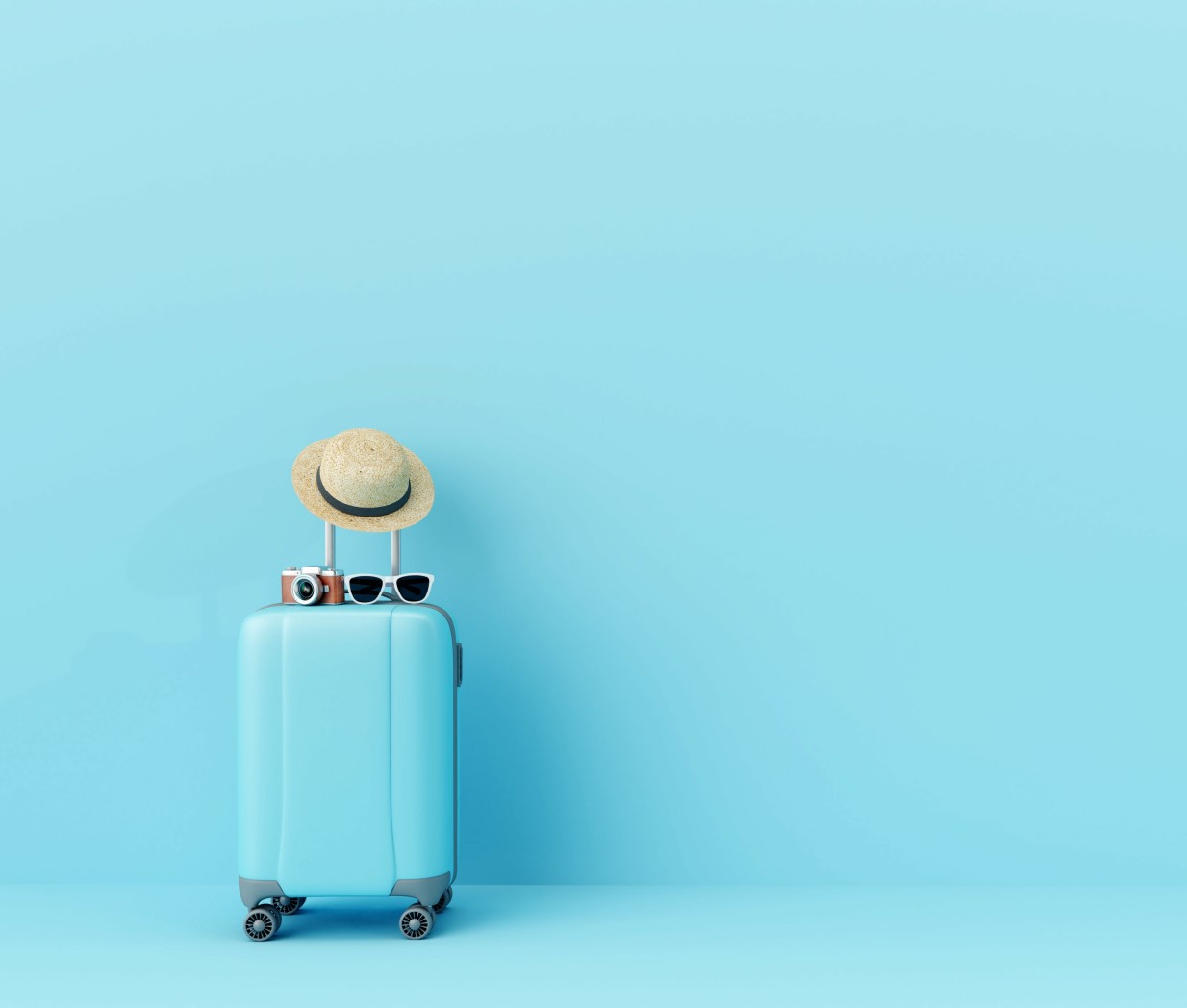 Blue suitcase with sun glasses