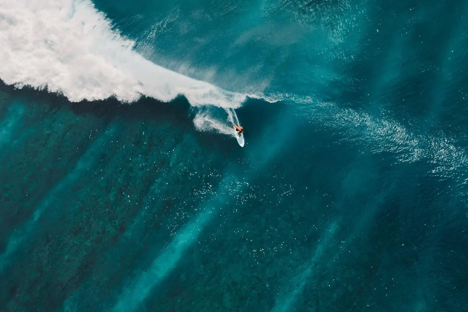 Aerial view with surfing on wave